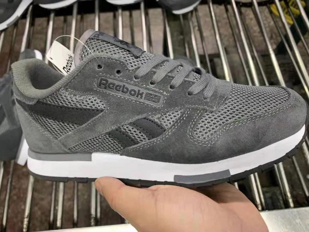 gray reebok suede sneaker